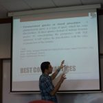 Amir Sadeghian presenting his research paper at a conference in Kuala Lumpur, Malaysia